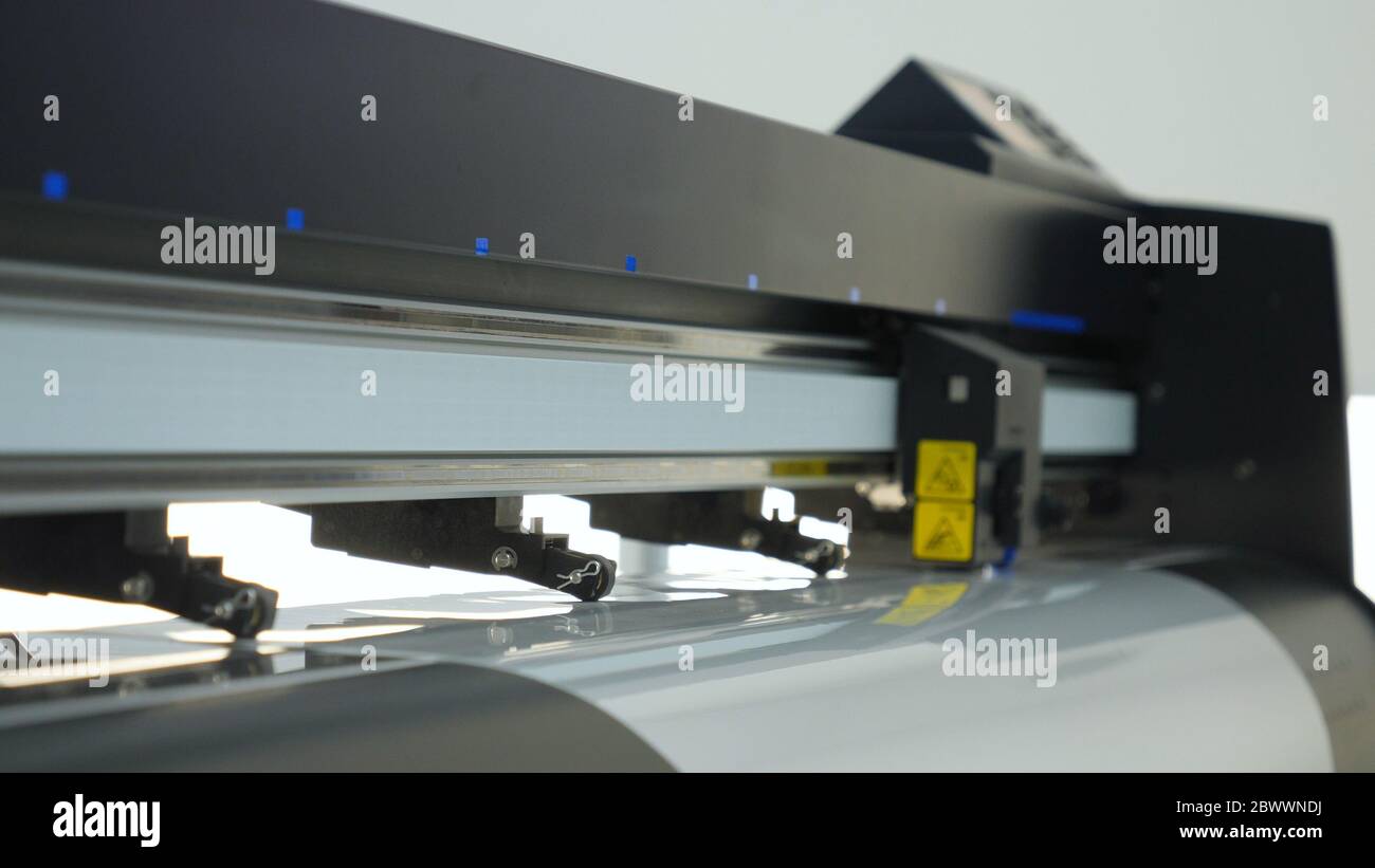Industrial worker input data programing for CNC milling machine. Stock Photo