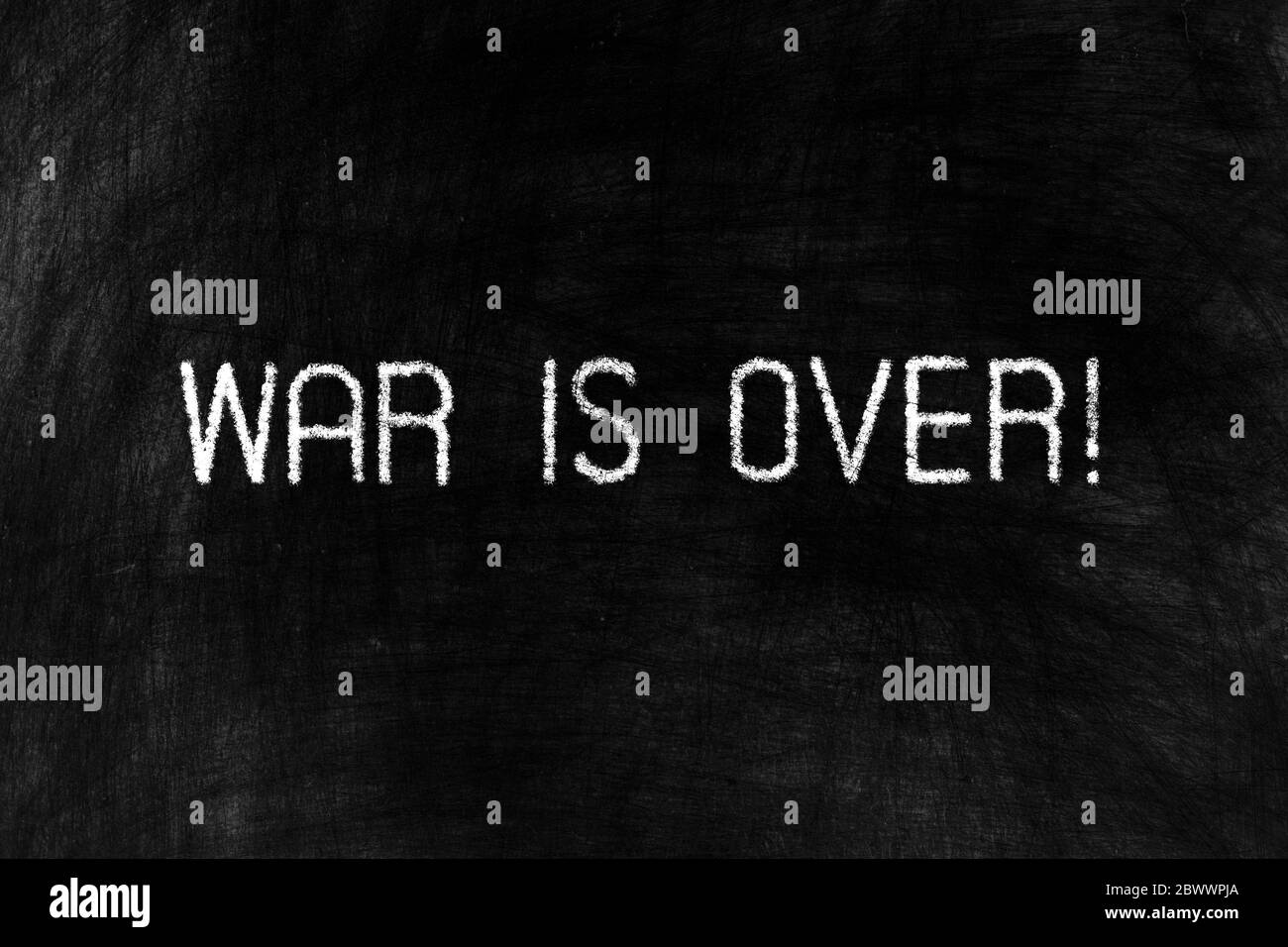 War is Over on Grunge Chalkboard Background. Stock Photo