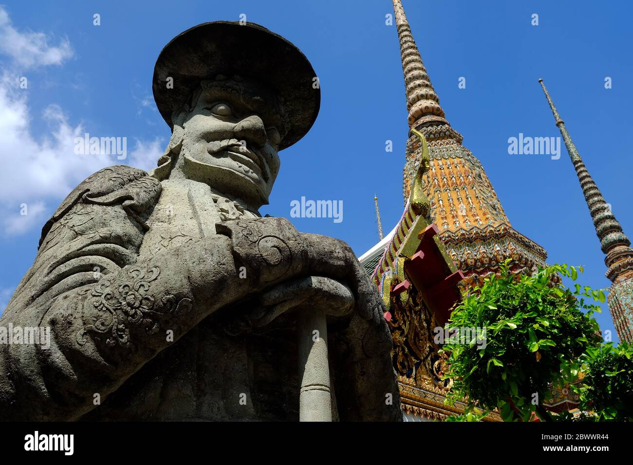 Close up Ancient Guardian Giants in Front of Wat Pho Temple Entrance, Bangkok Thailand. Stock Photo