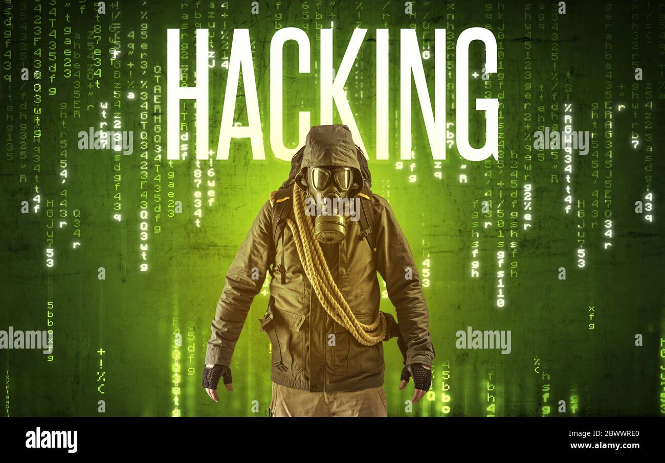 Faceless hacker with HACKING inscription, hacking concept Stock Photo