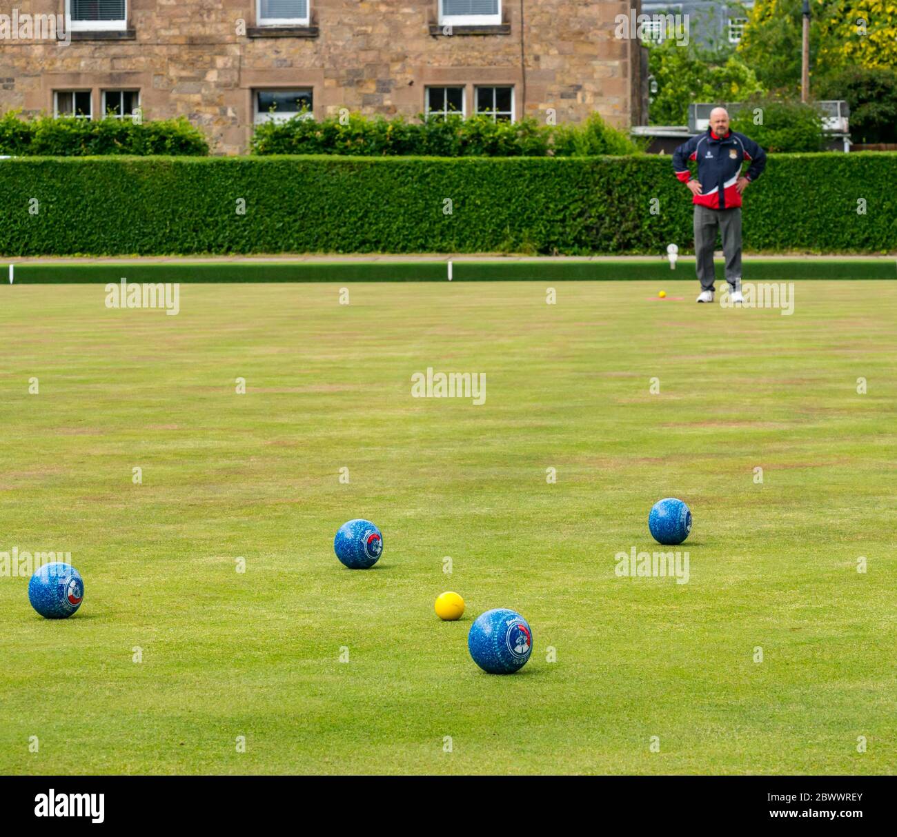 Haddington, East Lothian, Scotland, UK, 03 June 2020. Scotland's oldest bowling club reopening: Scotland’s oldest bowling club reopens after lockdown restrictions are eased. The club celebrated its 300th anniversary in 2009, and has about 75 full members. Pictured: Scott Milne, one of four club member first to play on the green today after the club closed last September Stock Photo