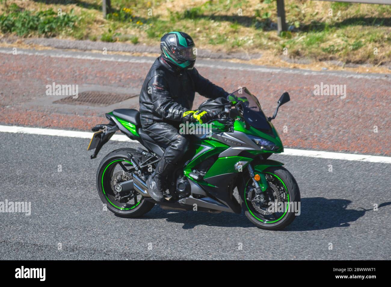 KAWASAKI Z1000SX ; Motorbike rider; two wheeled transport, motorcycles, vehicle, roads, motorbikes, bike riders motoring on the M6 motorway Chorley, UK Stock Photo