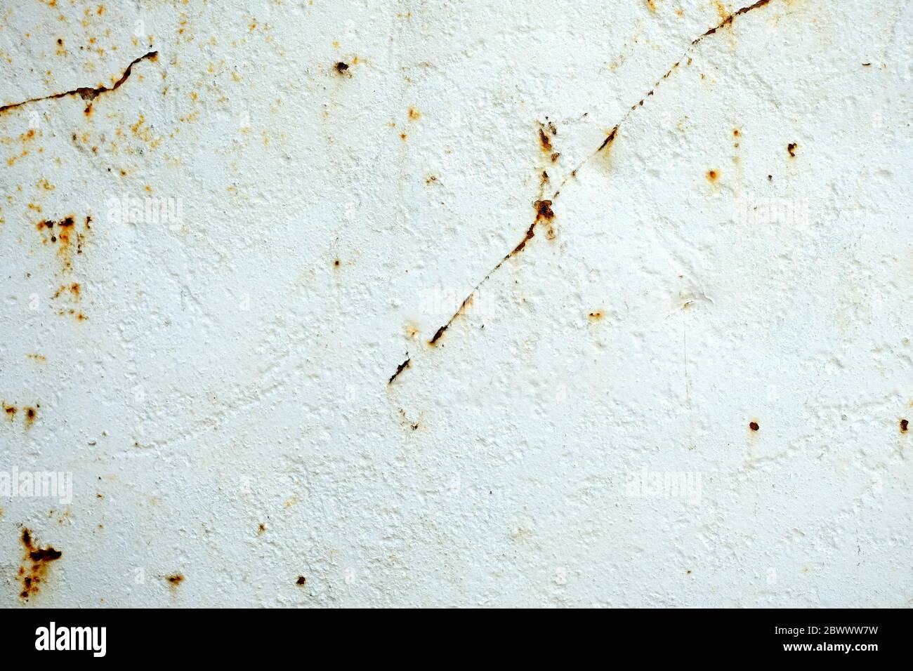 White Peeling Paint and Rusty on Metal Background. Stock Photo