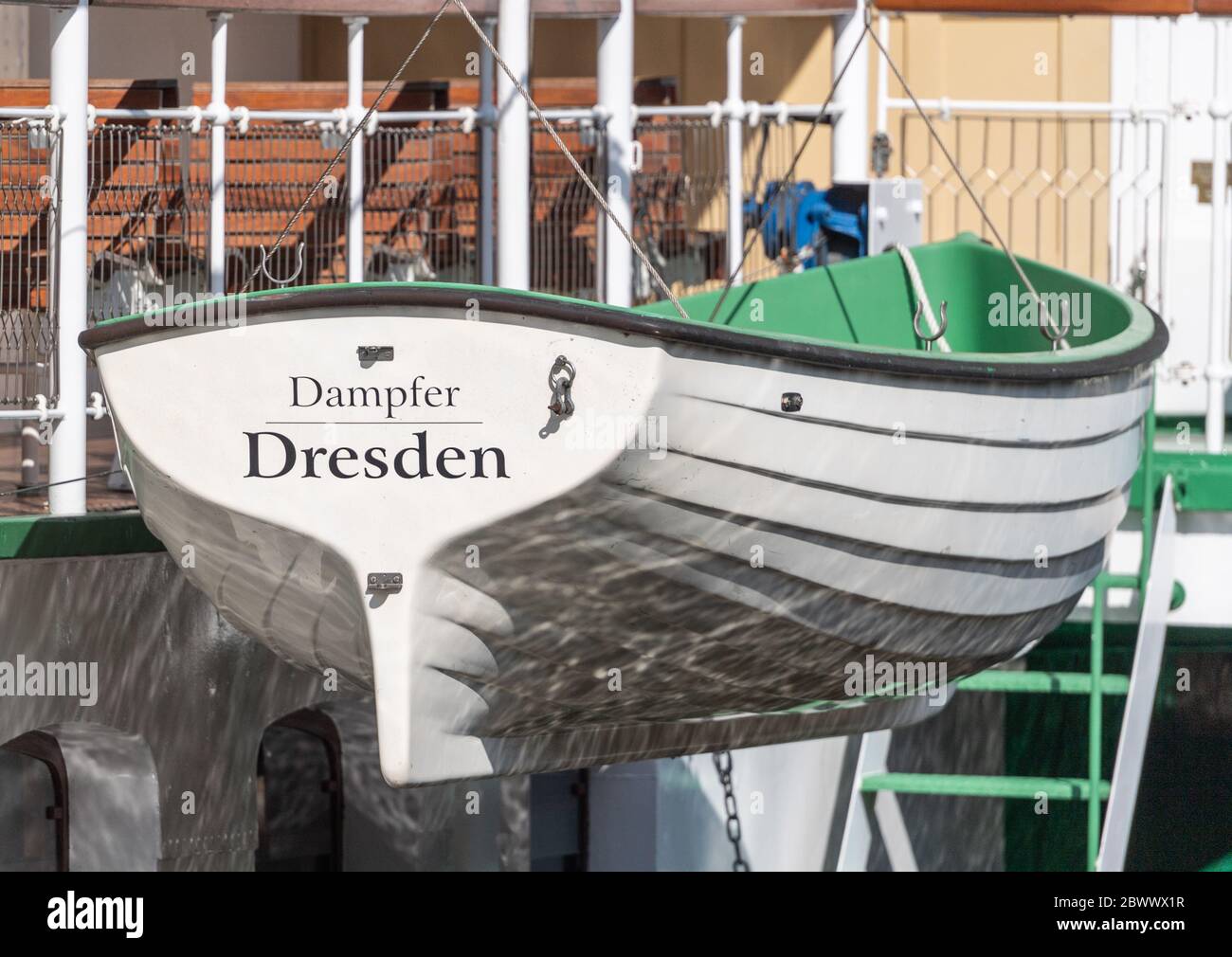 Dresden, Germany. 03rd June, 2020. A lifeboat hangs from the paddle wheel steamer 'Dresden' on the side. The Sächsische Dampfschiffahrt Dresden (SDS) has filed for insolvency. The background is financial difficulties, for which the SDS had blamed the missing tranche of a loan from the Free State last week. The 'White Fleet' operates with nine paddle steamers built between 1879 and 1929 as well as two modern passenger ships and is considered the oldest and largest fleet of paddle steamers in the world. Credit: Robert Michael/dpa-Zentralbild/dpa/Alamy Live News Stock Photo