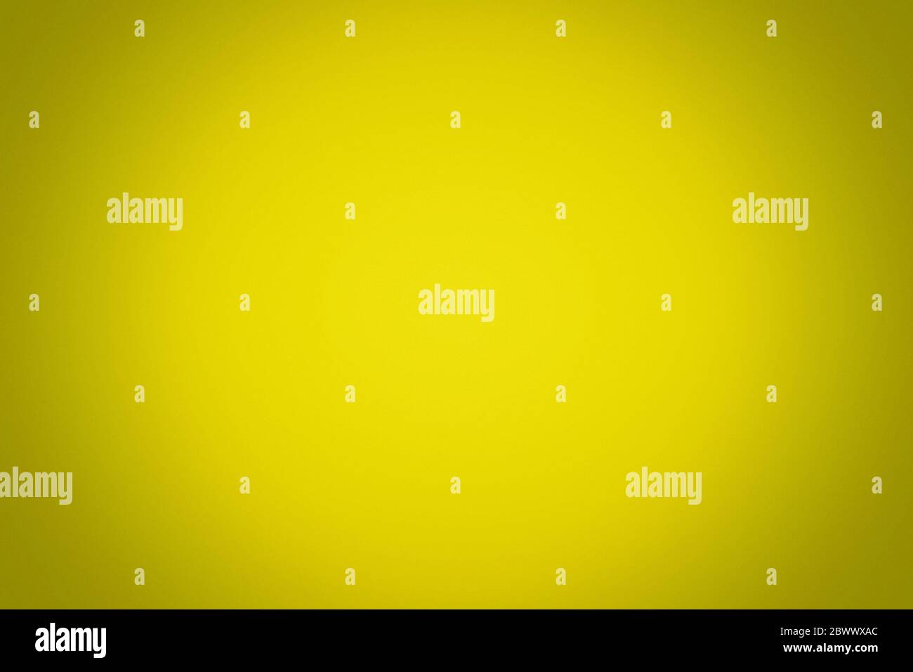 Abstract Bright Yellow Gradient Texture Background with Grain. Stock Photo