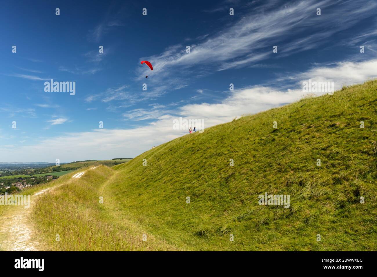 Westbury White Horse chalk grassland with a red hand glider and a