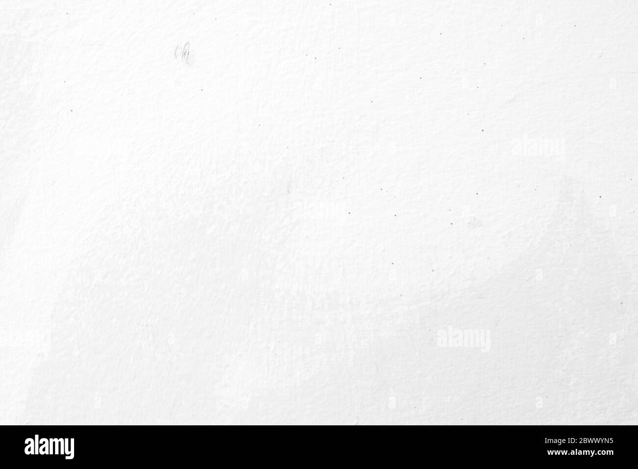 Unfinished White Painting on Concrete Wall Texture Background Stock