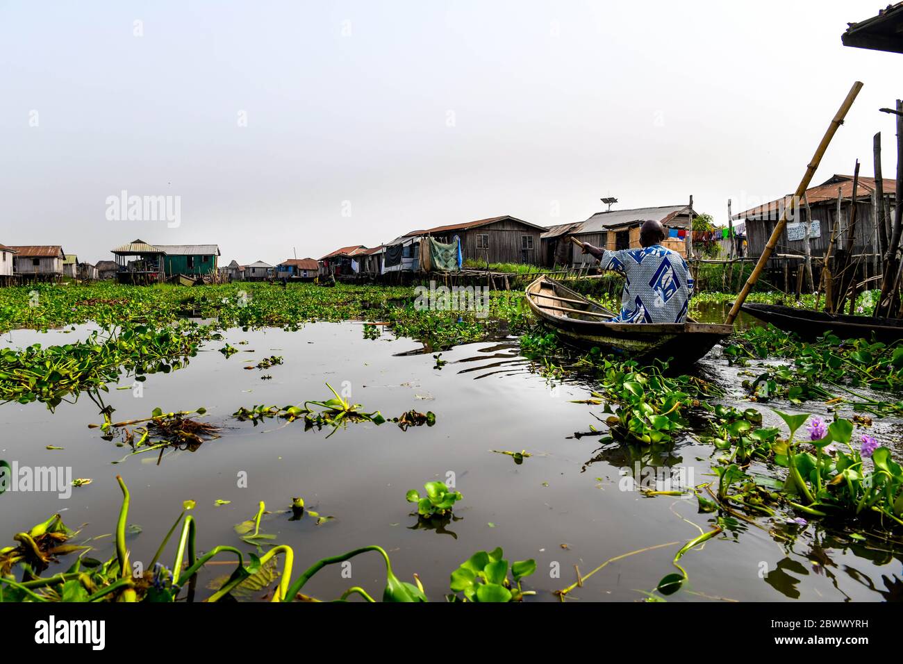 Africa, West Africa, Benin, Lake Nokoue, Ganvié. Pirogues in the water streets of the lakeside town of Ganvié. Stock Photo