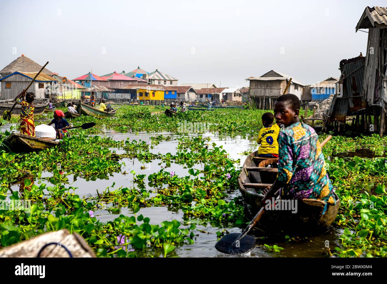 Africa, West Africa, Benin, Lake Nokoue, Ganvié. Pirogues in the water streets of the lakeside town of Ganvié. Stock Photo