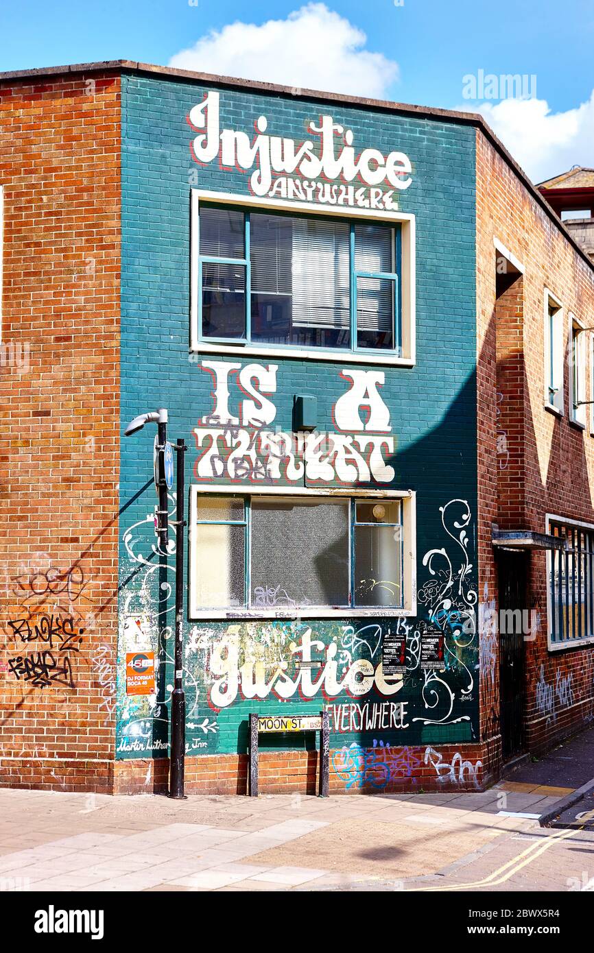 Injustice Wall Mural in Bristol, UK, England Stock Photo