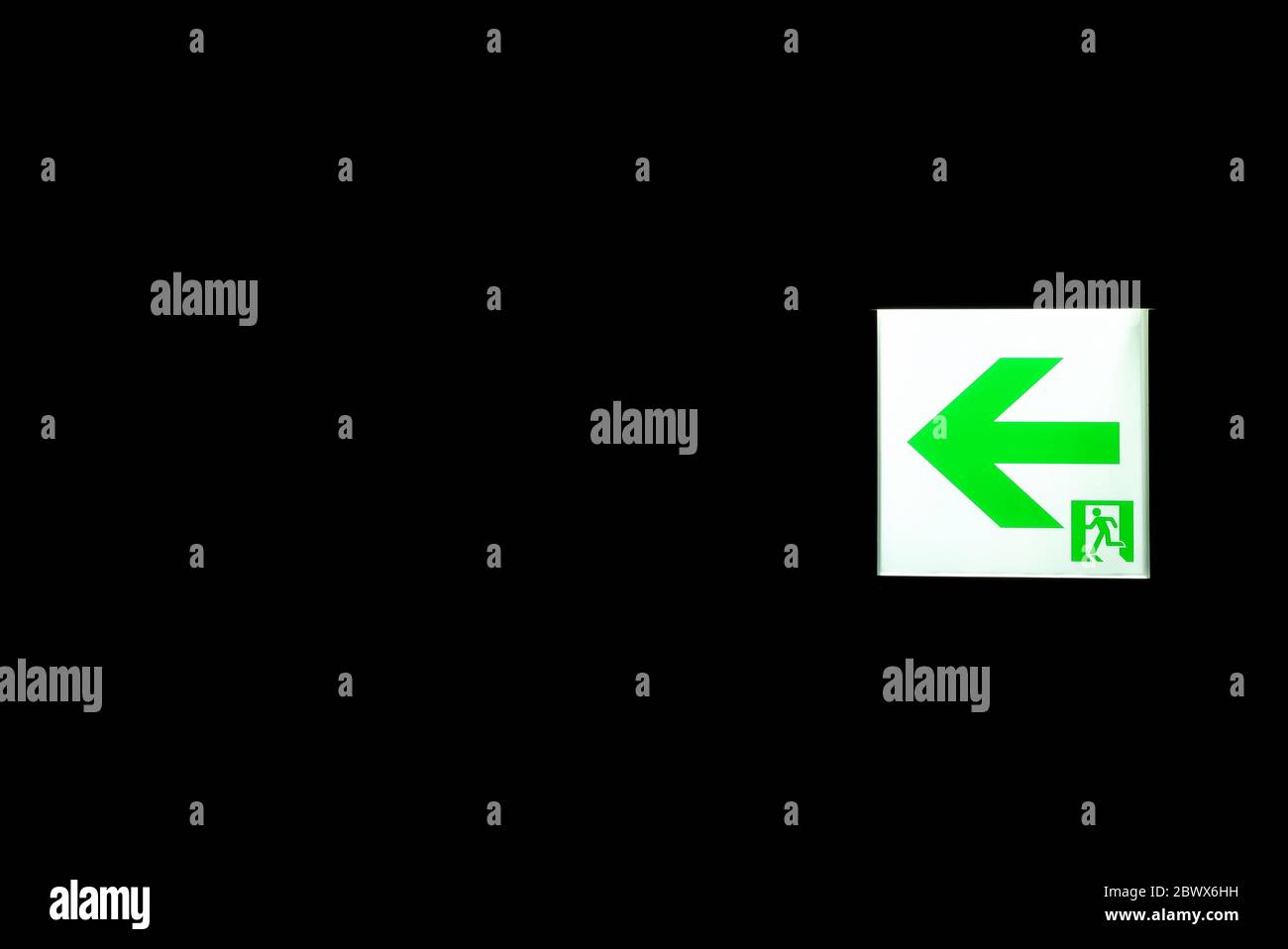 Emergency Exit Sign in the Dark Room Stock Photo Alamy