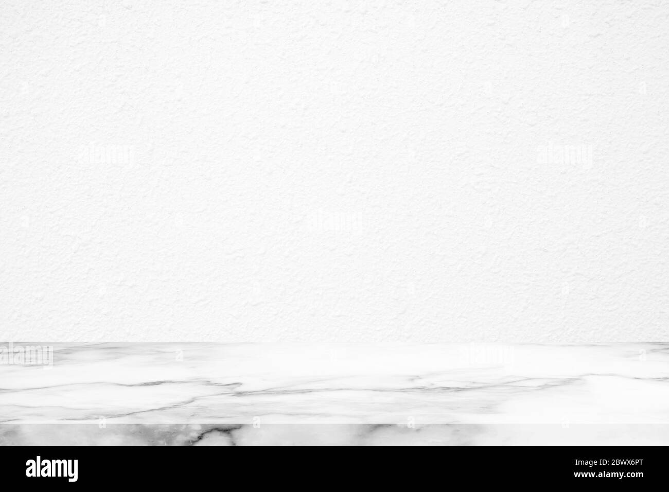 Abstract Luxury White Marble Table with Stucco Wall Background Stock