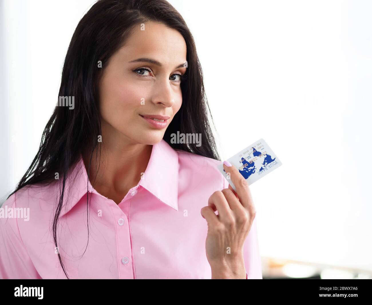 Woman paying for product by credit card Stock Photo