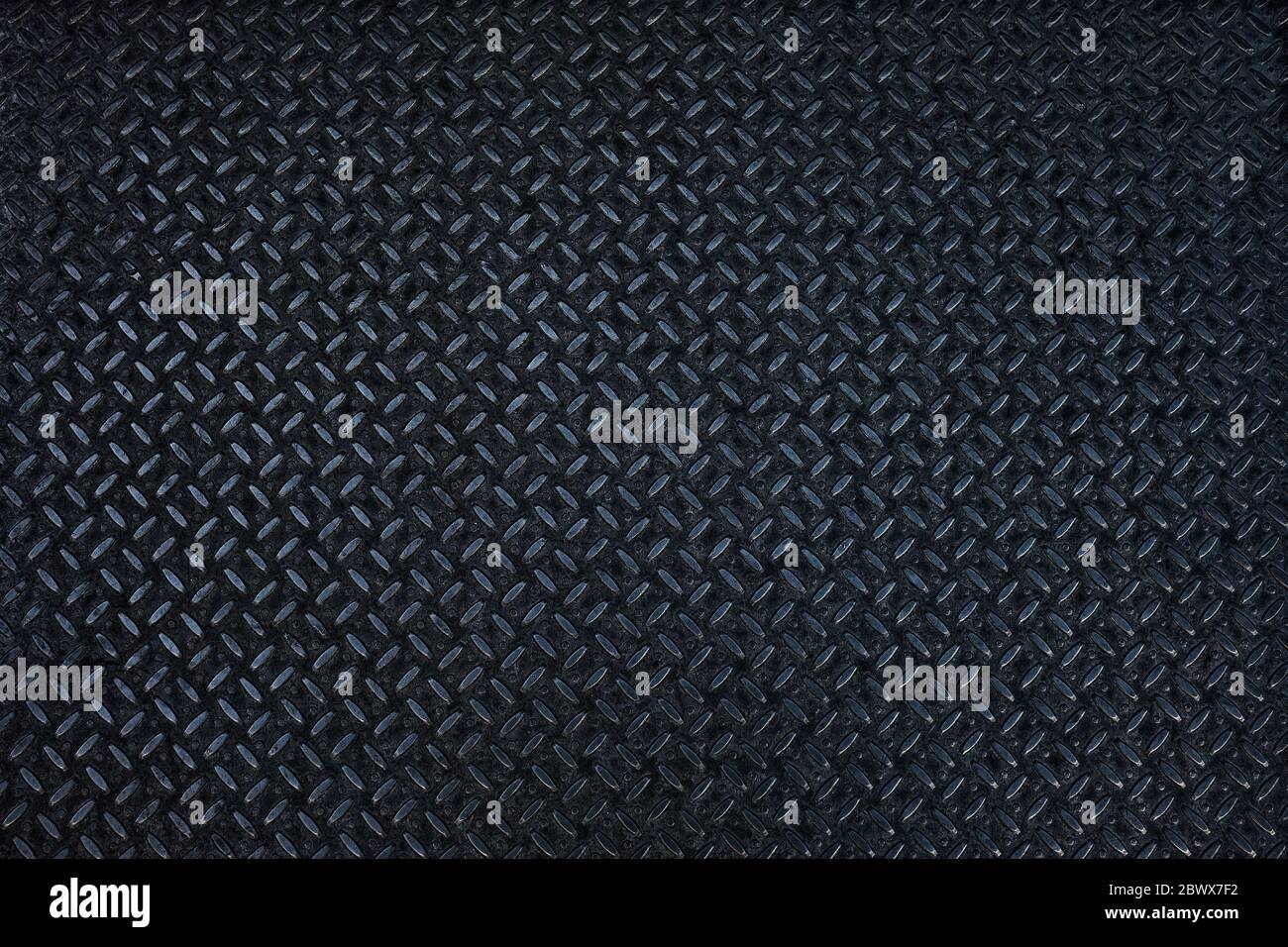 Black Metal Diamond Plate Texture Background. Stock Photo