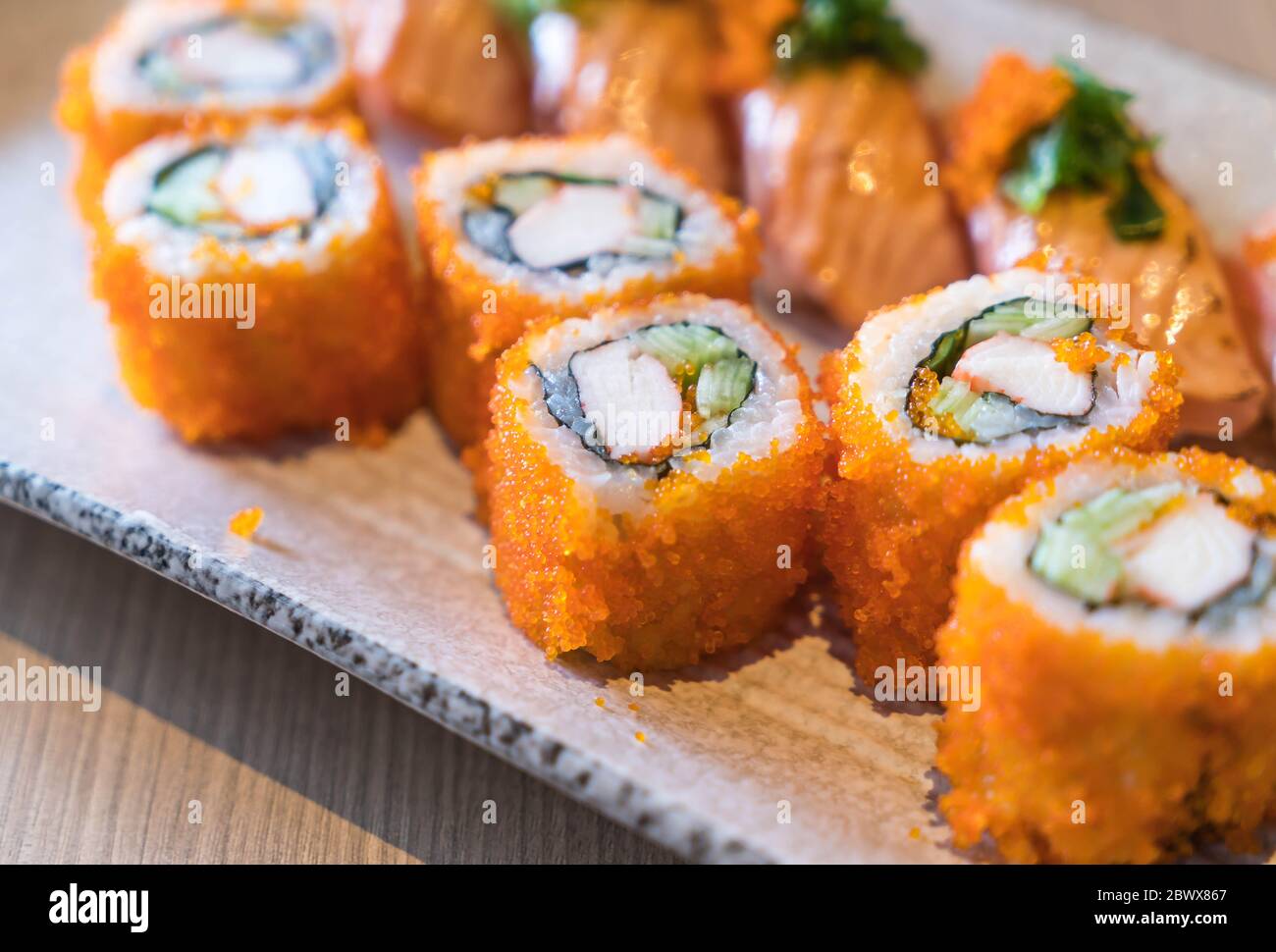 salmon sushi and salmon maki japanese food Stock Photo Alamy
