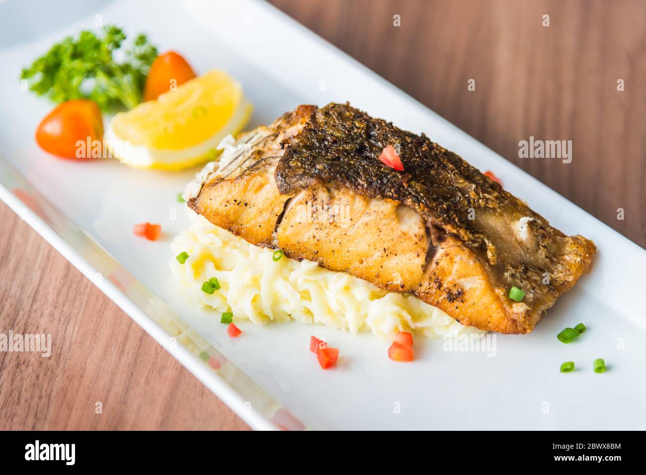 Sea bass grilled steak Stock Photo Alamy