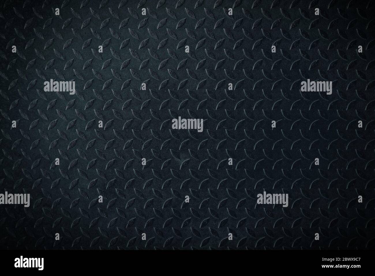 Black Metal Diamond Plate Texture Background. Stock Photo