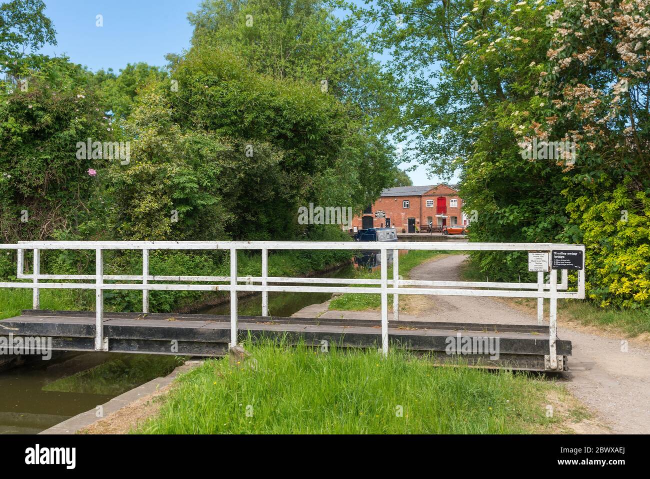 Swingbridge over the Coventry canal at Fradley Junction in Staffordshire which is at the junction of the trent and mersey canal and coventry canal Stock Photo