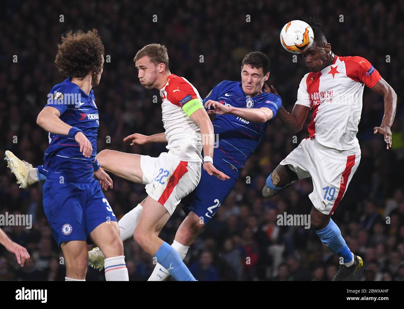 LONDON, ENGLAND - APRIL 18, 2019: Tomas Soucek of Slavia (L), Andreas Christensen of Chelsea (C) and Simon Deli of Slavia (R) pictured during the second leg of the 2018/19 UEFA Europa League Quarter-Finals game between Chelsea FC (England) and SK Slavia Praha (Czech Republic) at Stamford Bridge. Stock Photo