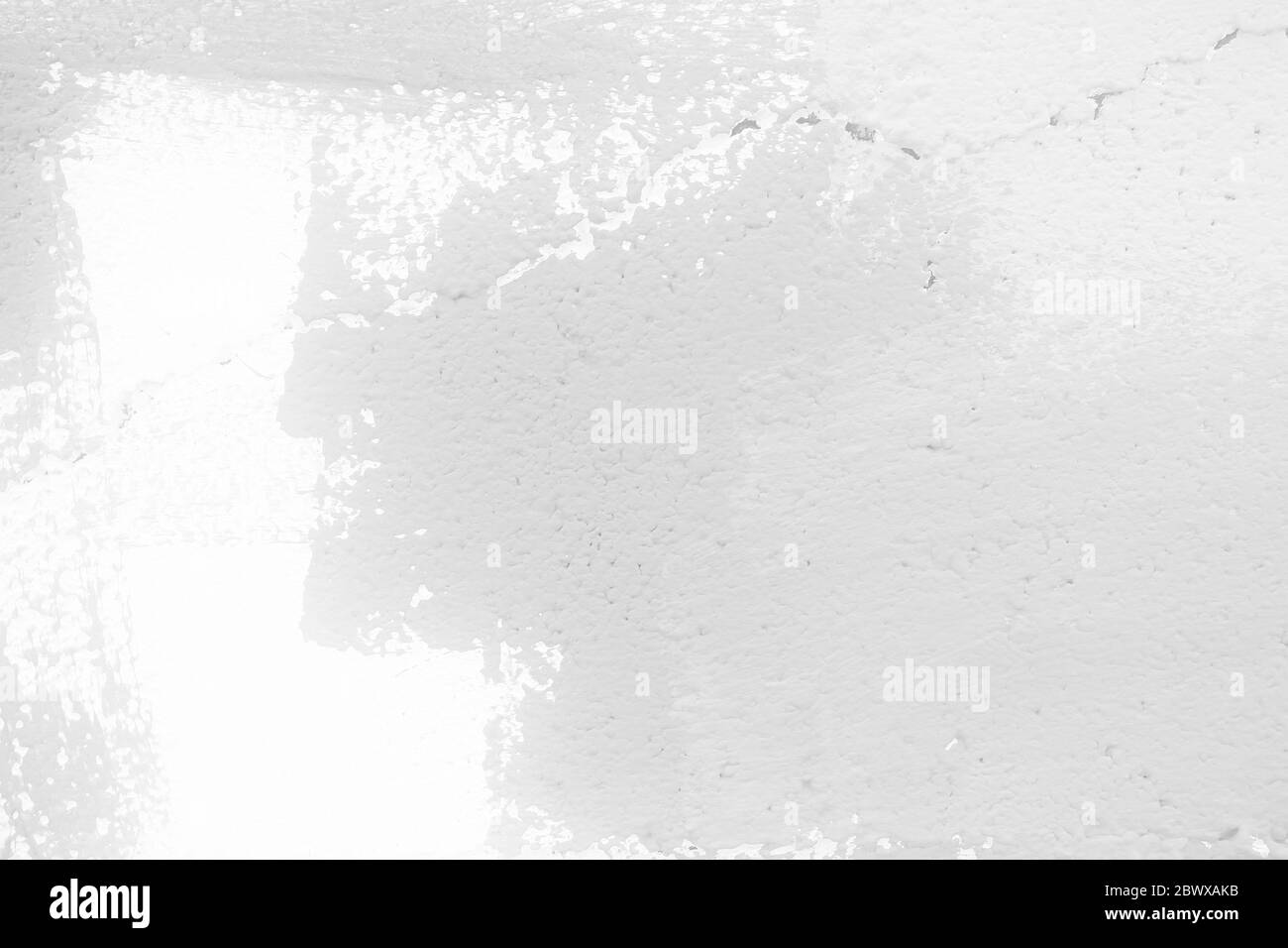 White Painting on Broken Concrete Wall Texture Background. Stock Photo