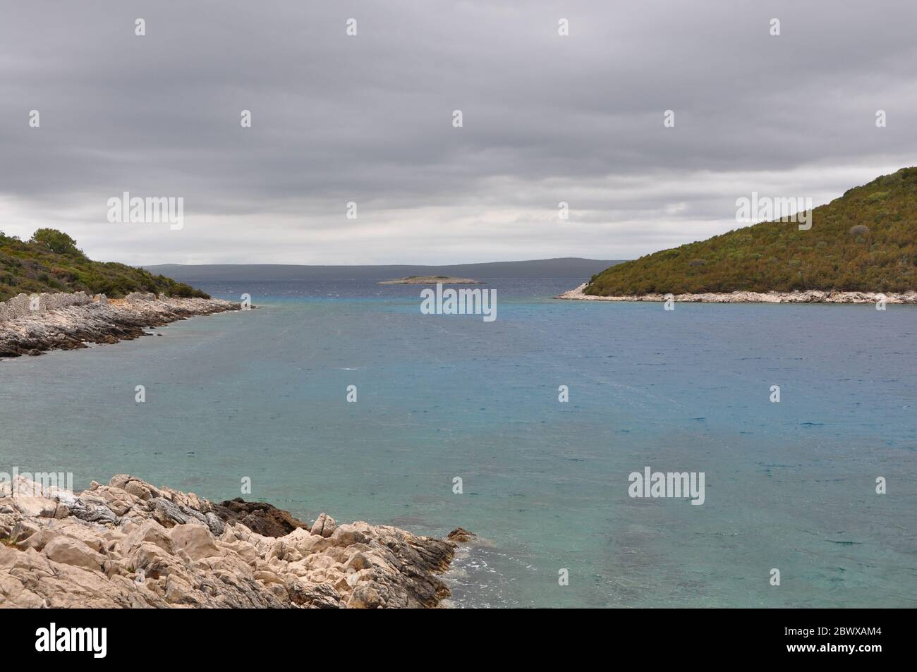 View of small tropical island in Croatia.Isolated islands near Losinj. Stock Photo