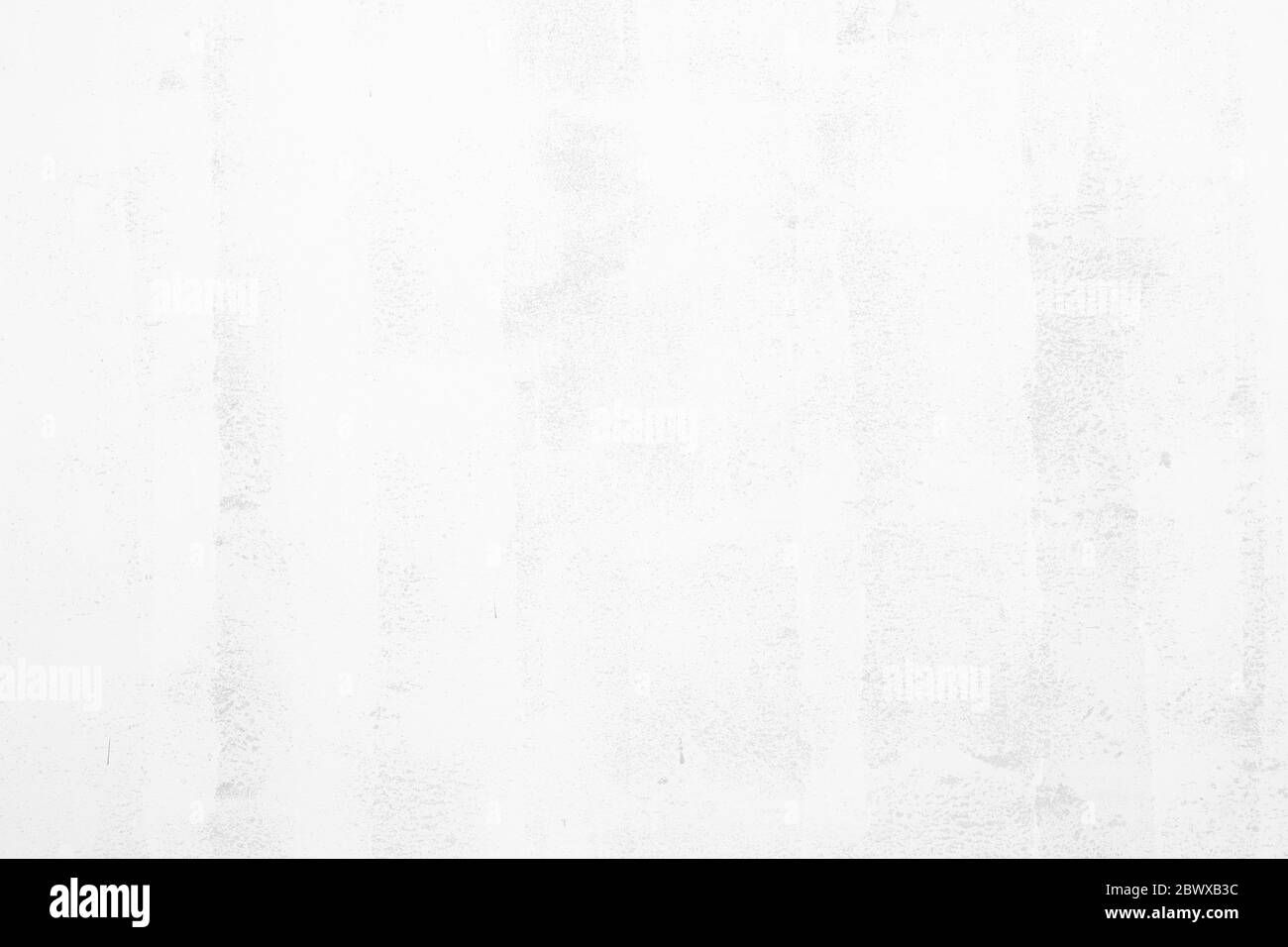 White Grunge Painting on Concrete Wall Texture Background. Stock Photo