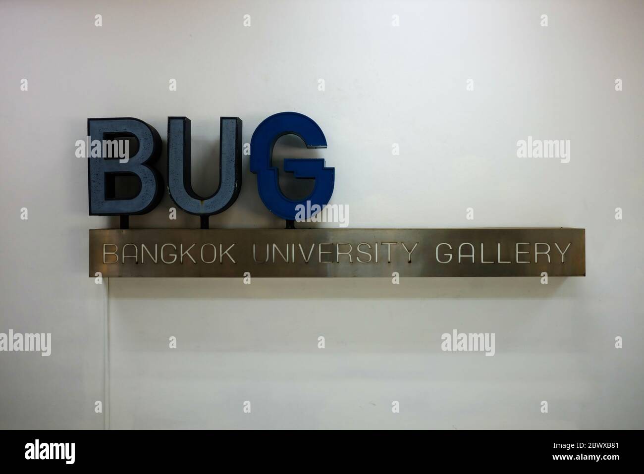 BANGKOK, THAILAND - FEBRUARY 25, 2020: BUG gallery sign on white concrete wall. BUG is the art museum in Bangkok university where is a famous private Stock Photo