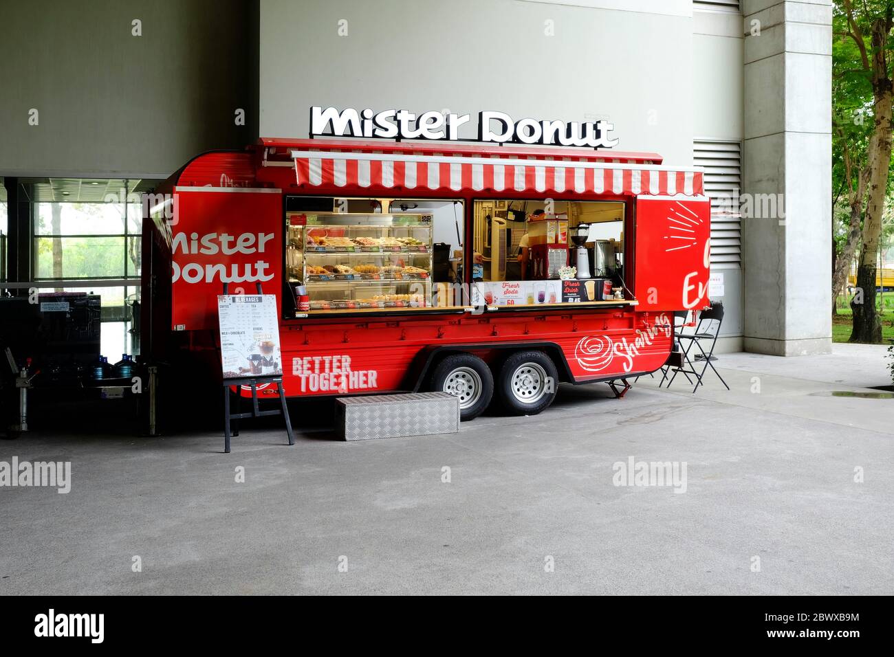 BANGKOK, THAILAND - FEBRUARY 11, 2020: Mister donut food truck in Bangkok University. Mister donut is famous donut franchise in Thailand. It is founde Stock Photo