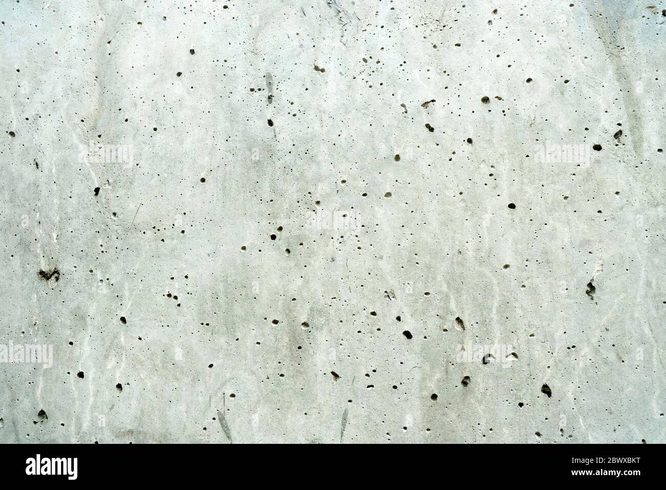 Grey Raw Concrete Wall Texture Background. Stock Photo