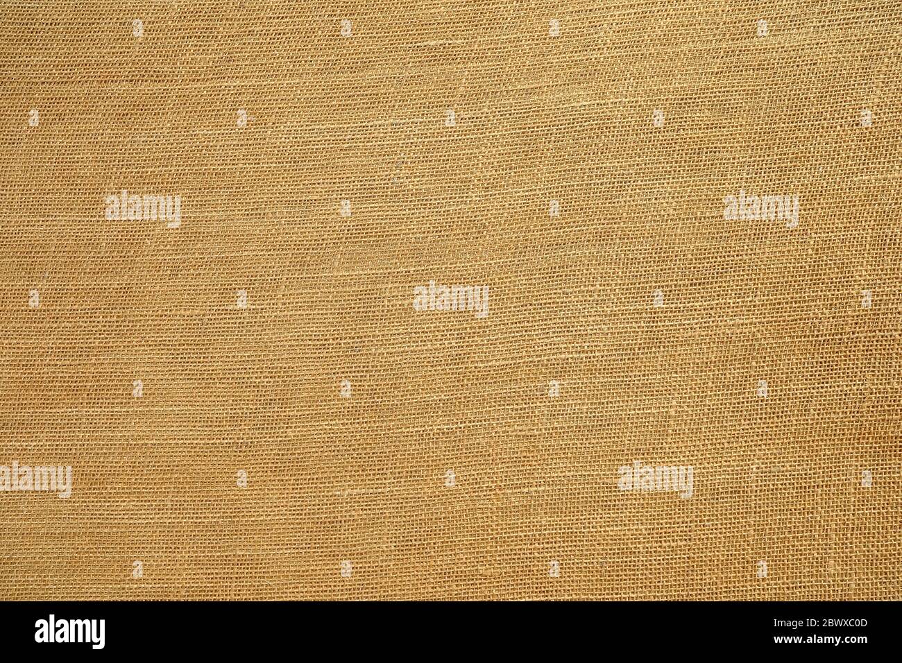 Old Brown Coarse Burlap Canvas Texture Background. Stock Photo