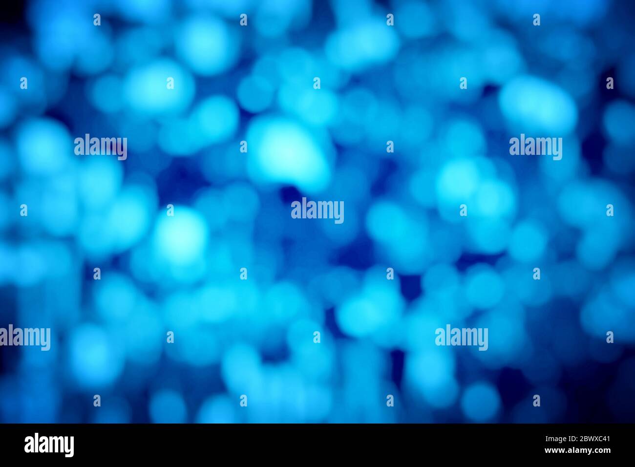 Blue light shine particles bokeh hi-res stock photography and images ...