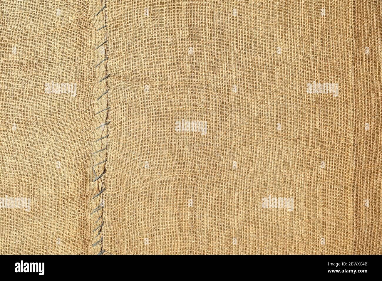 Old Brown Coarse Burlap Canvas Texture Background. Stock Photo