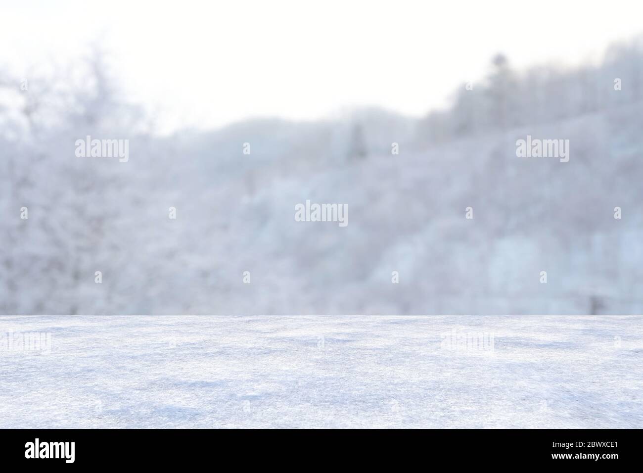 Abstract Snowy Ground with White Mountains in Winter Season Background, Suitable for Product Presentation Backdrop, Display, and Mock up. Stock Photo