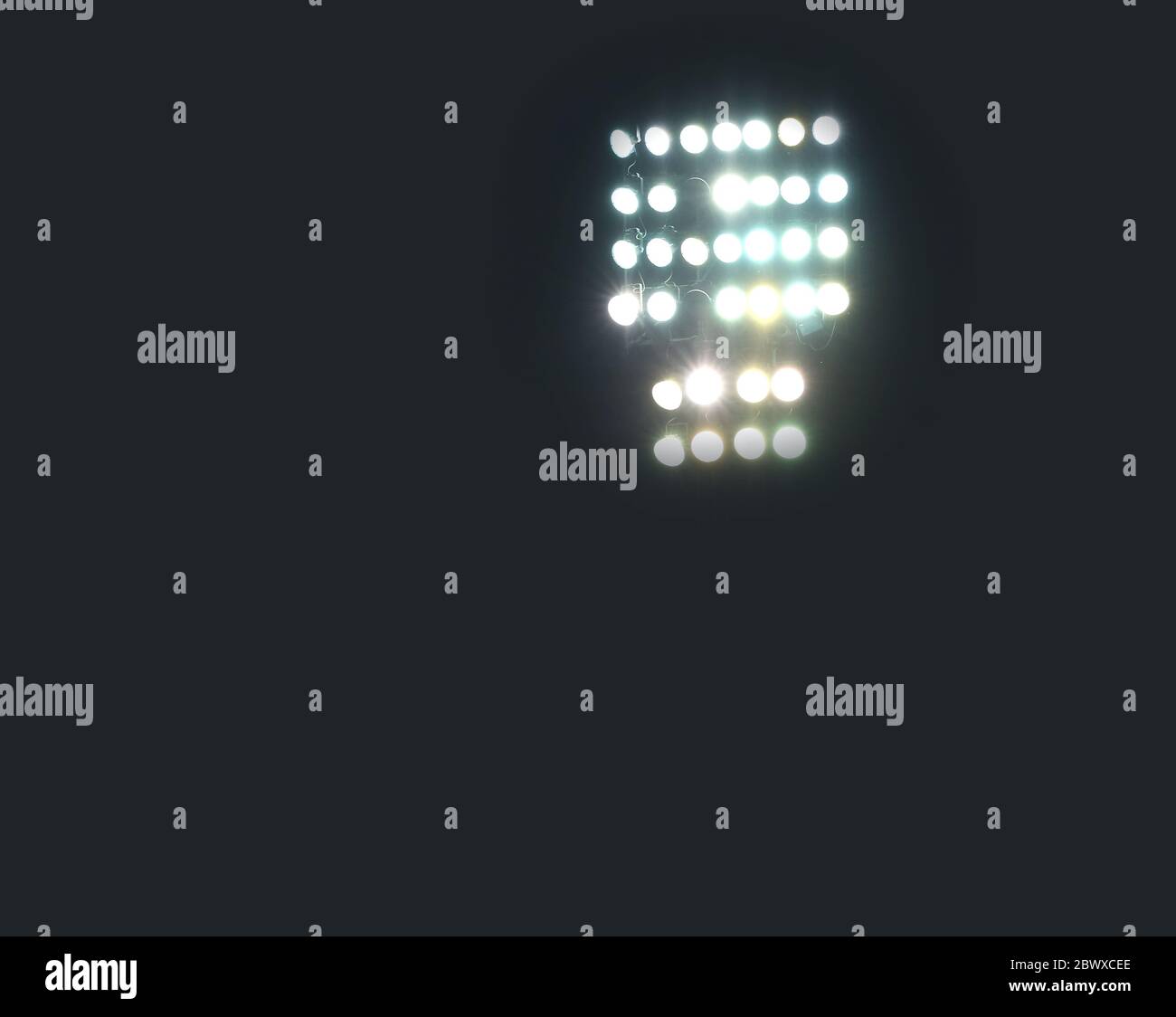 powerful spotlights in the stadium at night Stock Photo
