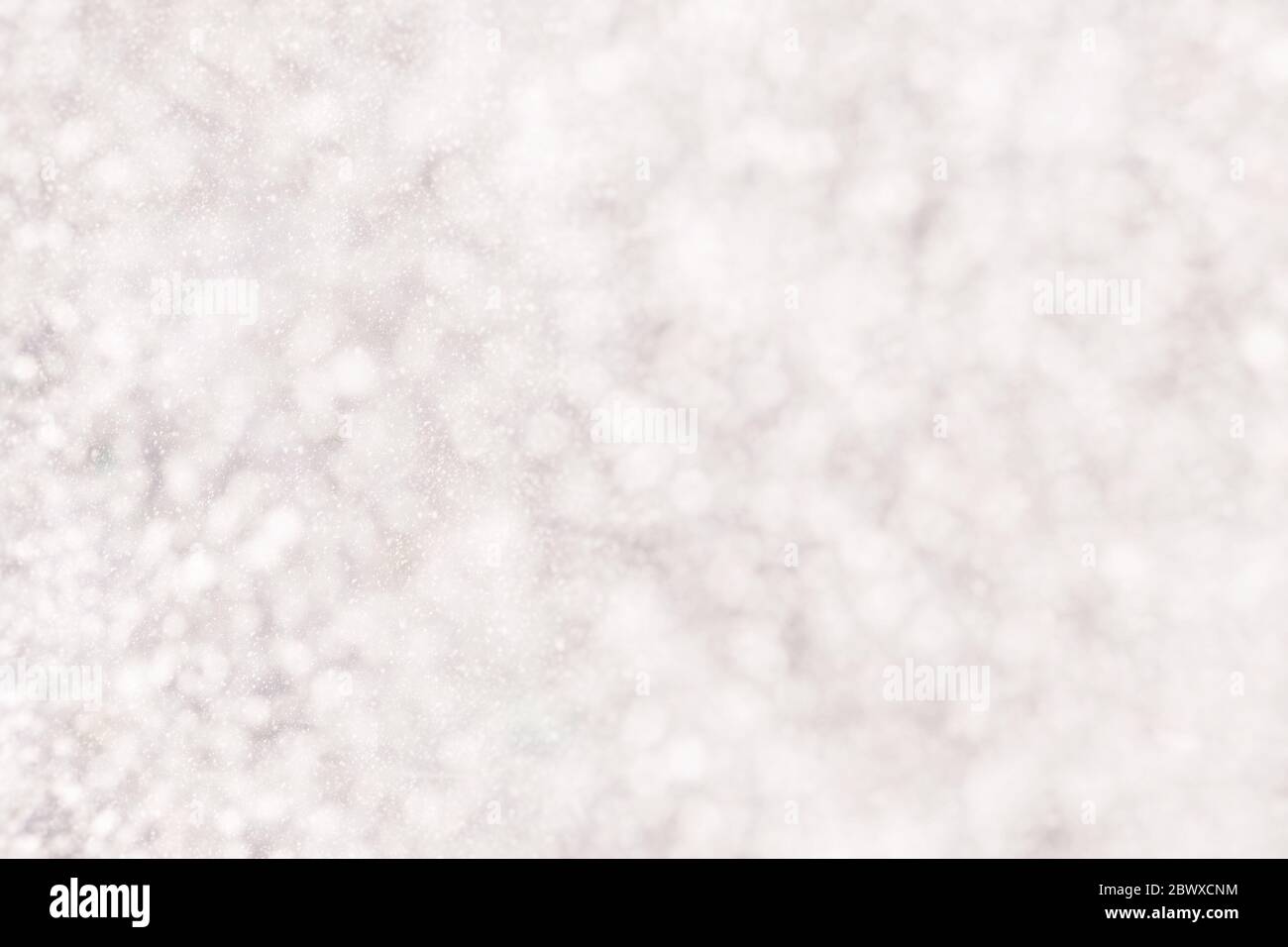 Abstract White Bokeh of Snow Storm Background. Stock Photo