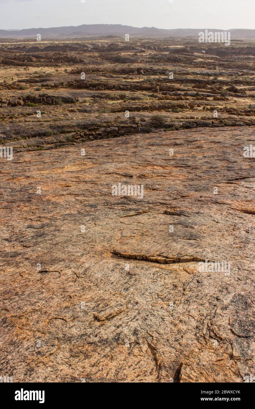 Moonscape like environment of the aptly named Moon Rock, an exfoliation dome in the Augrabies National Park, Northern Cape South Africa Stock Photo
