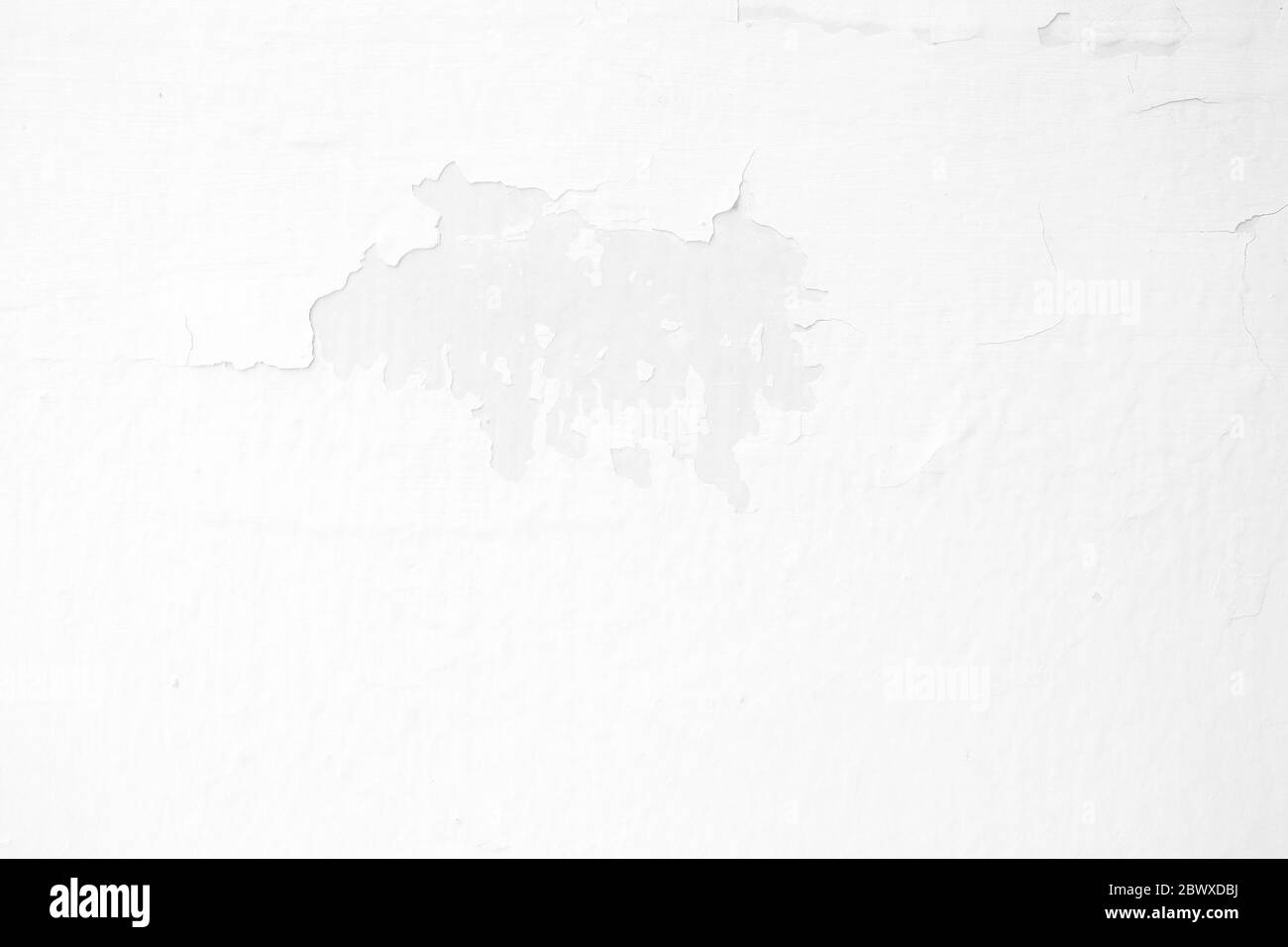 White Paint Cracking on Concrete Wall Texture Background. Stock Photo
