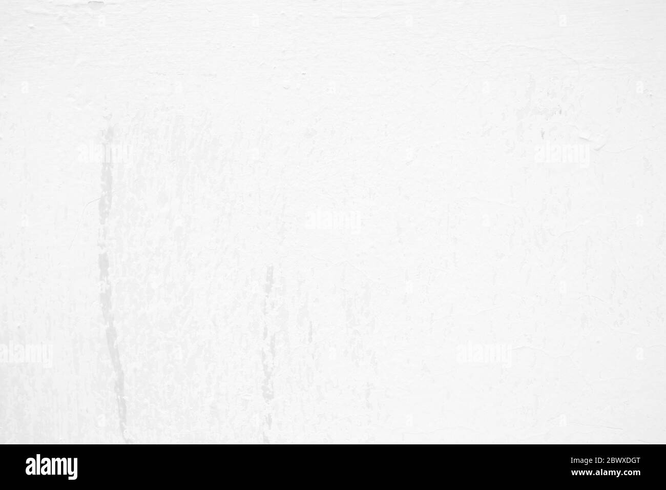 White Paint Cracking on Concrete Wall Texture Background. Stock Photo