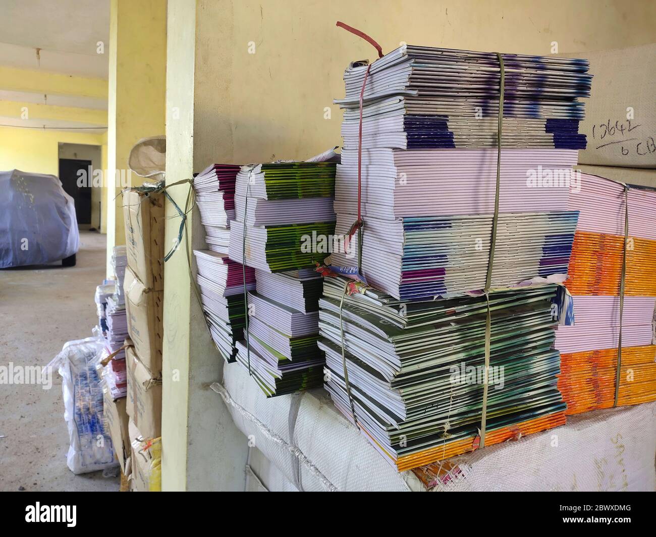 Bundle of school subject books are ready to distribute to school