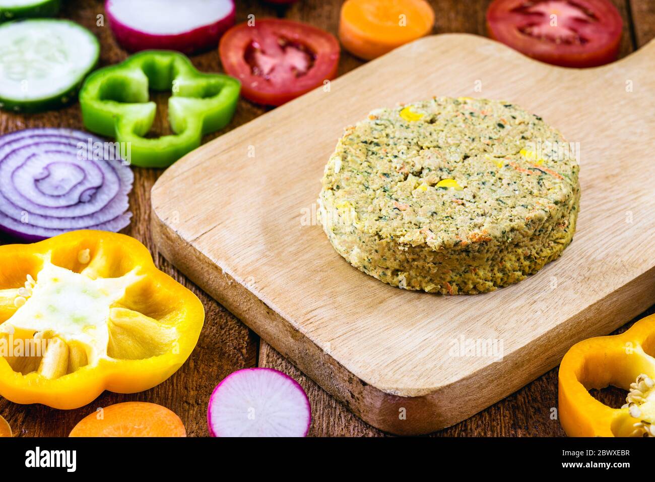 Vegan hamburger made without meat, without elements of animal origin, can be made of corn, potatoes, textured soy protein, legumes, tofu, mushrooms, c Stock Photo