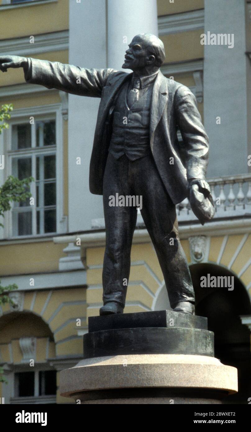 Facade of the Smolny Institute with a statue of Lenin in front, St ...