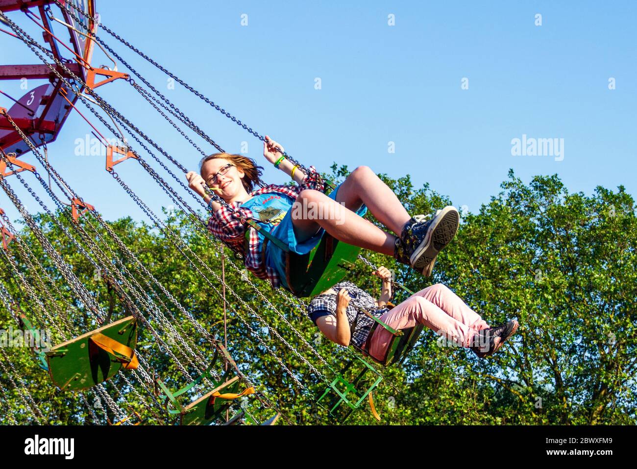 Swinging chairs ride hires stock photography and images Alamy