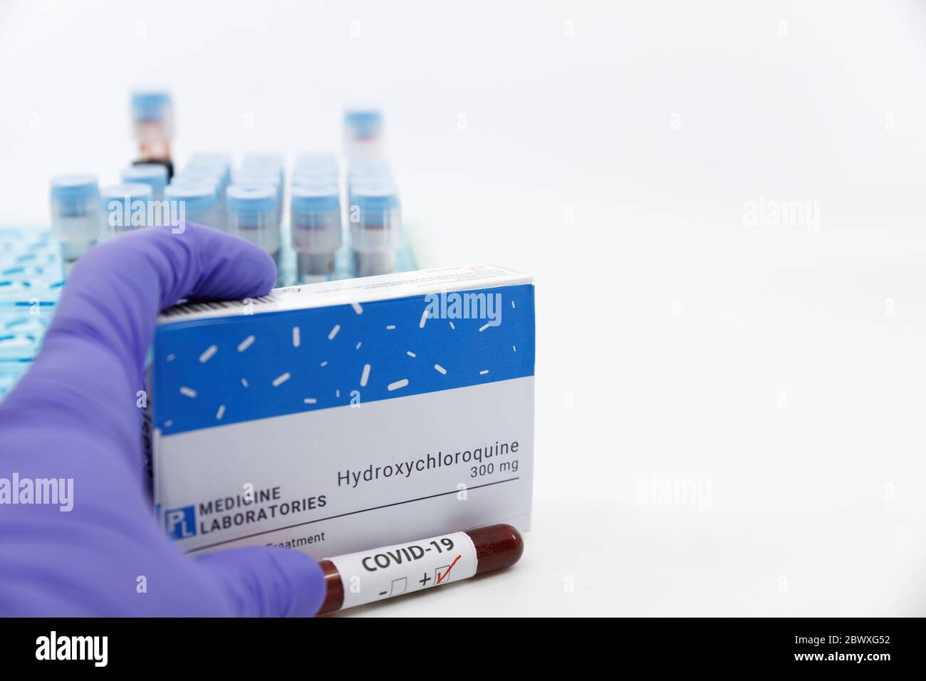 DubaiUAECirca 2020Doctor showing box of medicine with positive covid