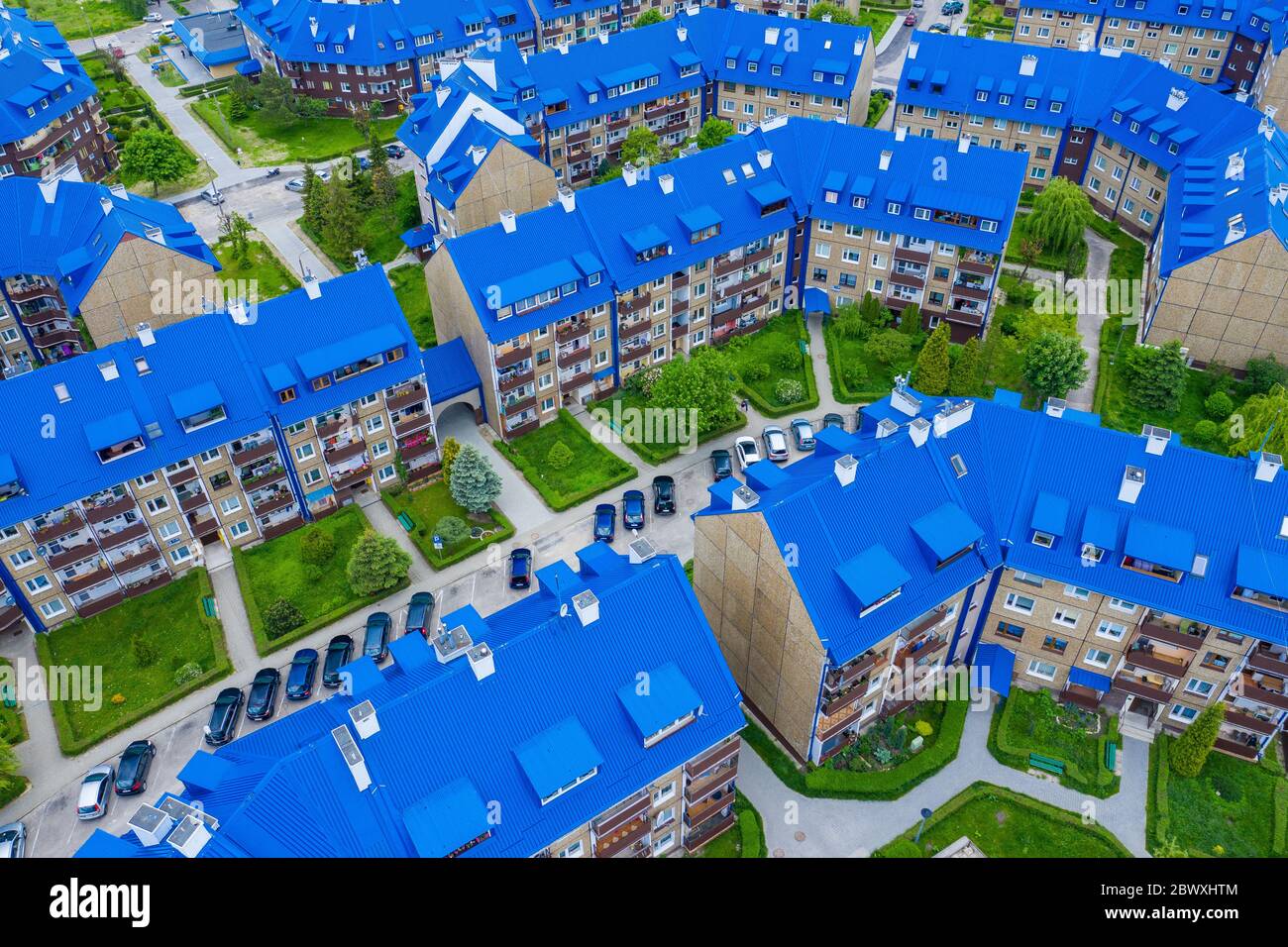 Aerial view of the housing estate with blue roofs. Estate Sloviki located in Olkusz, Poland. Stock Photo