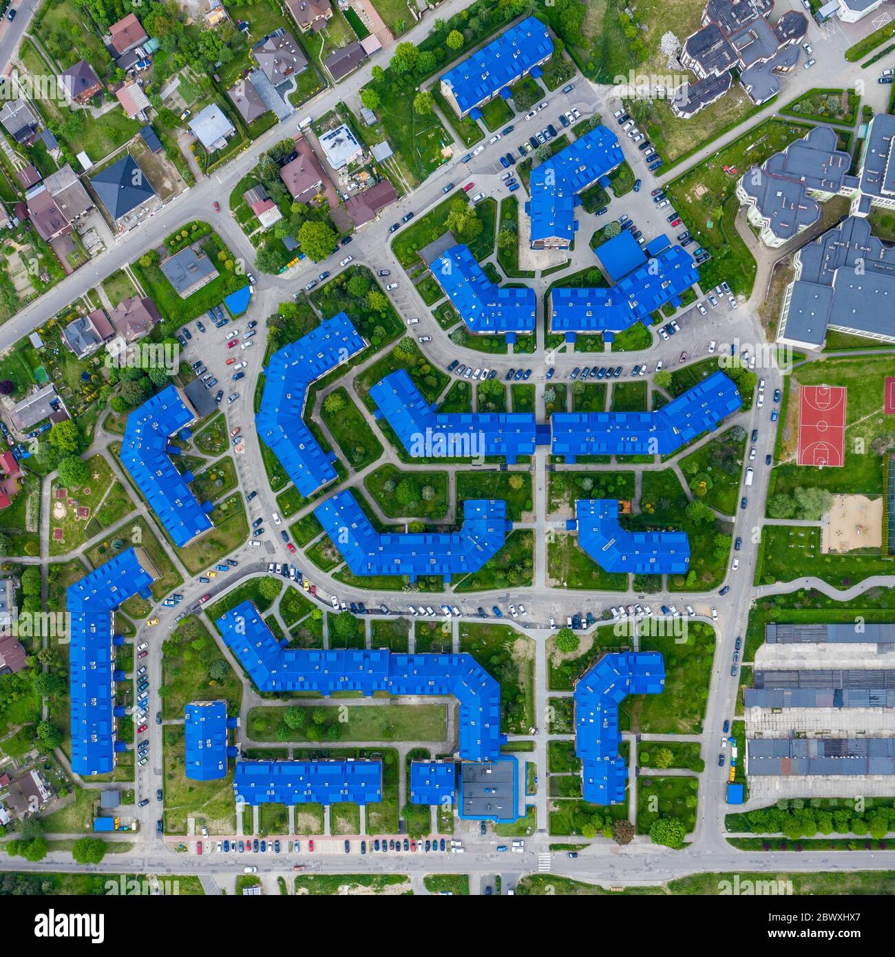 Aerial view of the housing estate with blue roofs. Estate Sloviki located in Olkusz, Poland. Stock Photo