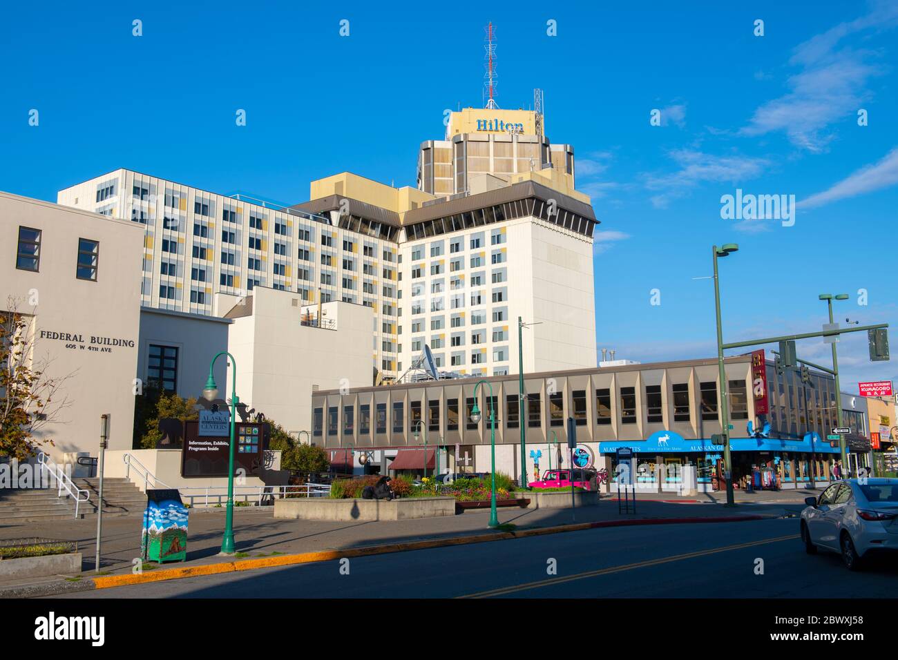 Historic buildings and Hilton Anchorage on 4th Avenue between E Street