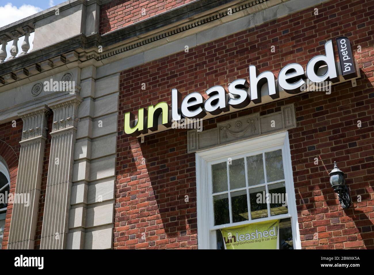 A logo sign outside of a Unleashed by Petco retail store location in Silver Spring, Maryland on May 23, 2020 Stock Photo