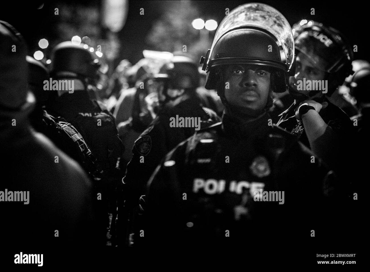 Looting during a riot Black and White Stock Photos & Images - Alamy