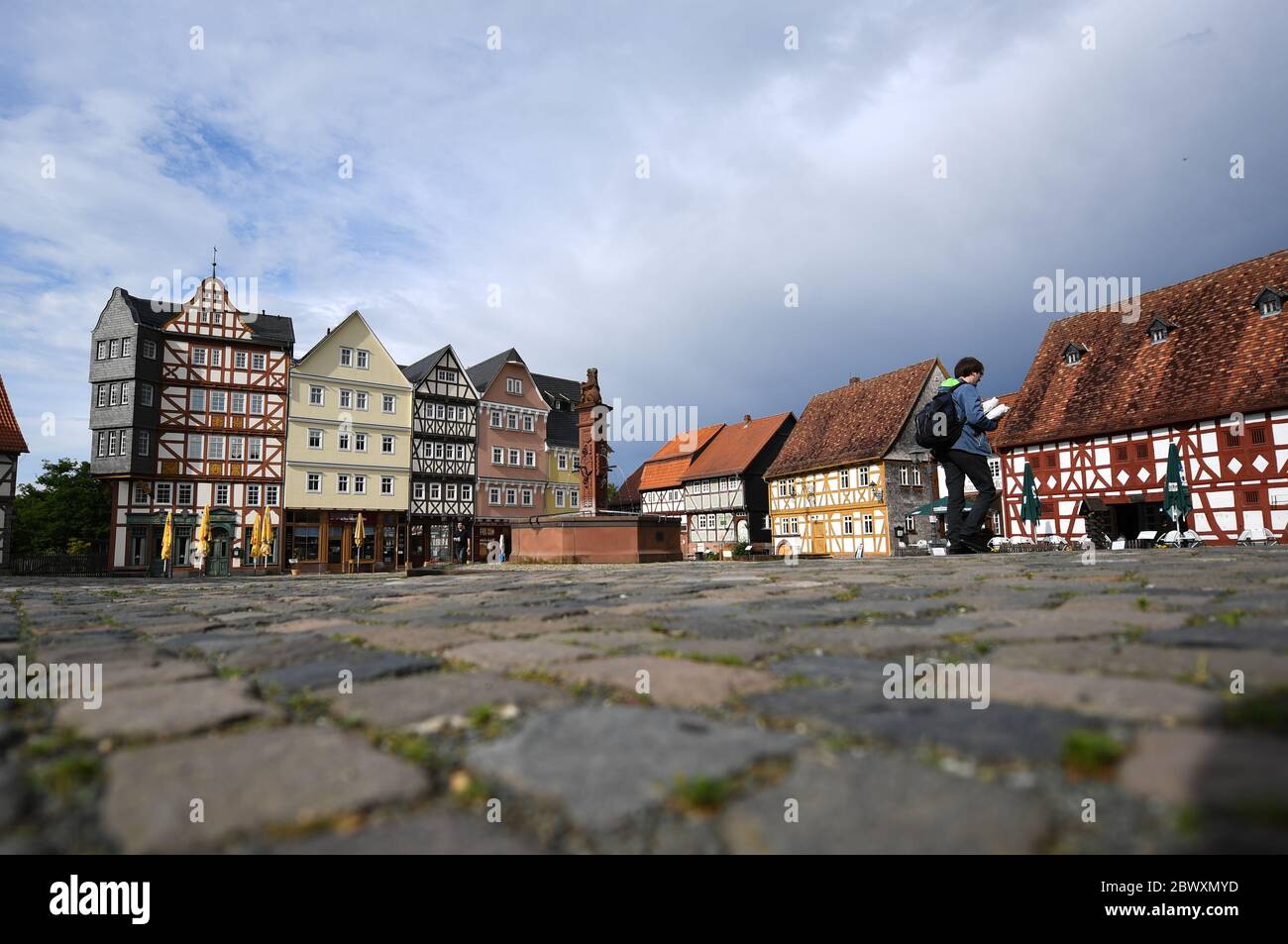Neu Anspach, Germany. 03rd June, 2020. Historic half-timbered houses line the market square of Hessenpark, a popular destination in the Taunus region. As the possibility of long-distance travel in Corona times remains uncertain, a holiday in the homeland is becoming the focus of attention for many people. (to dpa 'Minister Hinz presents tourism strategy for rural areas') Credit: Arne Dedert/dpa/Alamy Live News Stock Photo