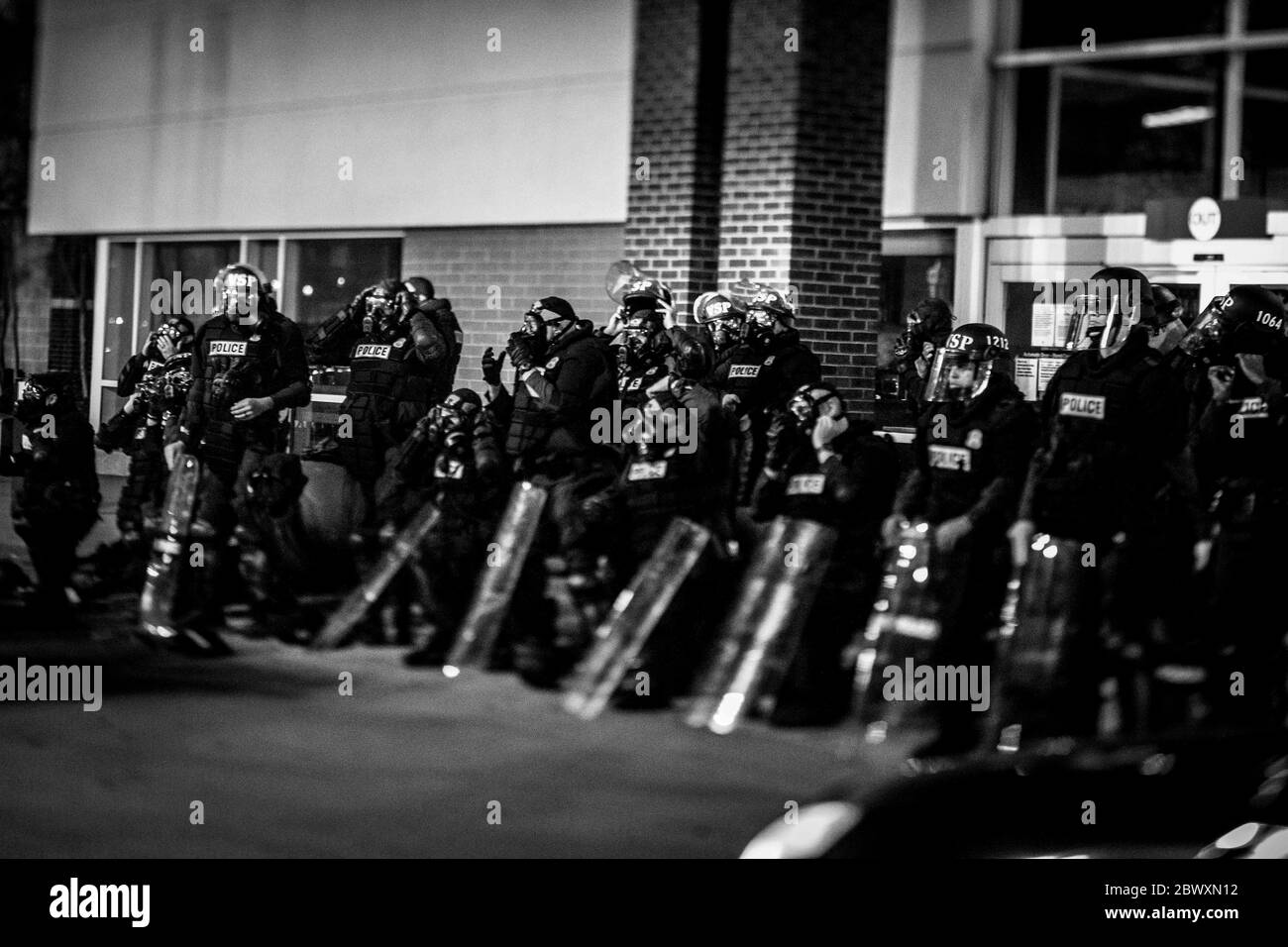 Hampton, Virginia, USA. 2nd June, 2020. Virginia State Police don protective mask at the Peninsula Town Center on Tuesday June 2, 2020 in Hampton, VA. The protest was deemed an unlawful assembly and tear gas, flashbang grenades, and riot control paintballs were used to disperse the crowd. Credit: John C. Clark/ZUMA Wire/Alamy Live News Stock Photo